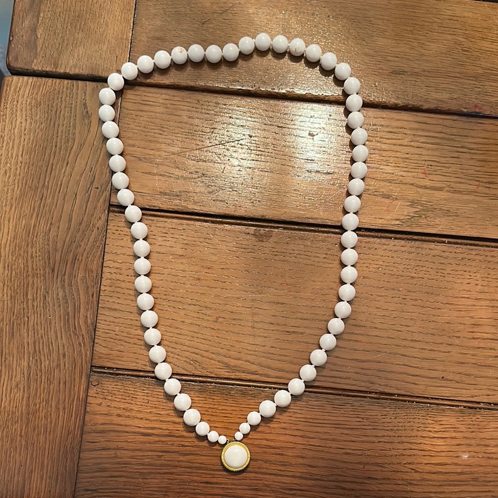 Elegant White Beaded Necklace with Gold Pendant